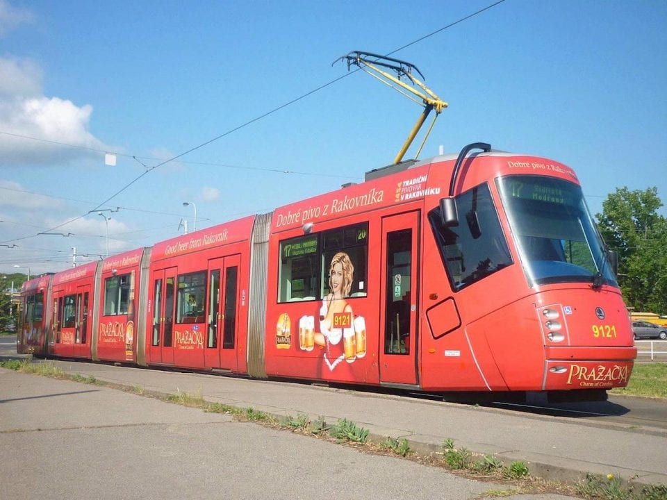 Trams with a Sexy Lady holding Beer